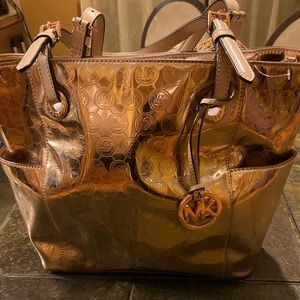 EUC, I carried this bag once, it’s a beautiful Natalie rose gold, leather straps